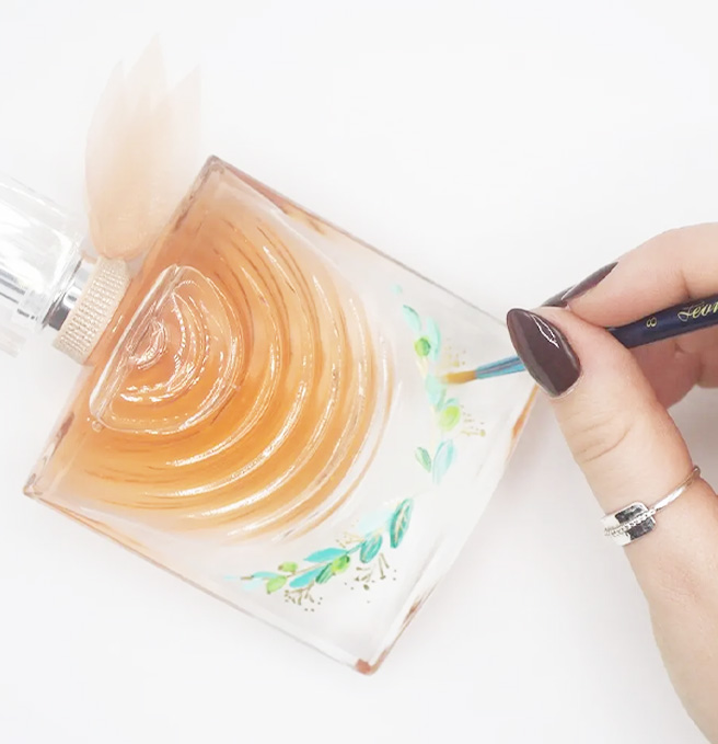 Animations retail Graphiplus — calligraphie, gravure et arts en boutique de luxe